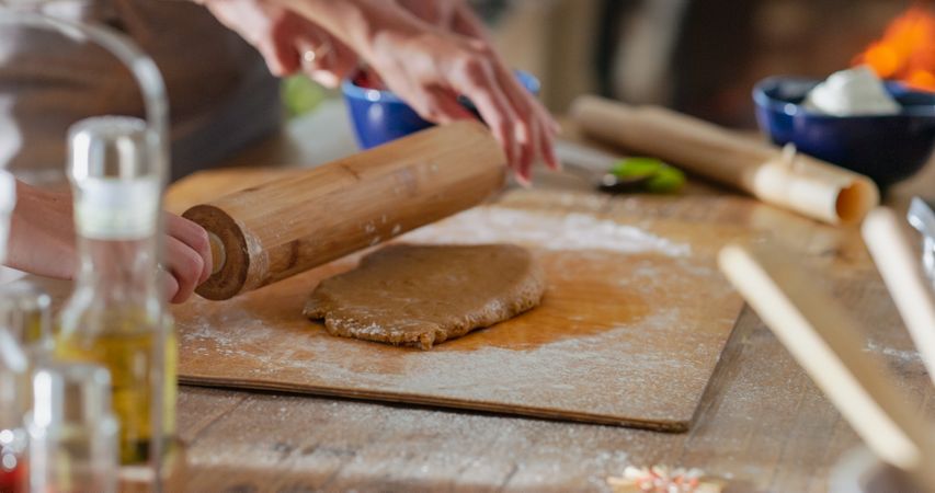 Close Up of Anonymous Female Preparing Dough for Making Gingerbread for Christmas at Home.