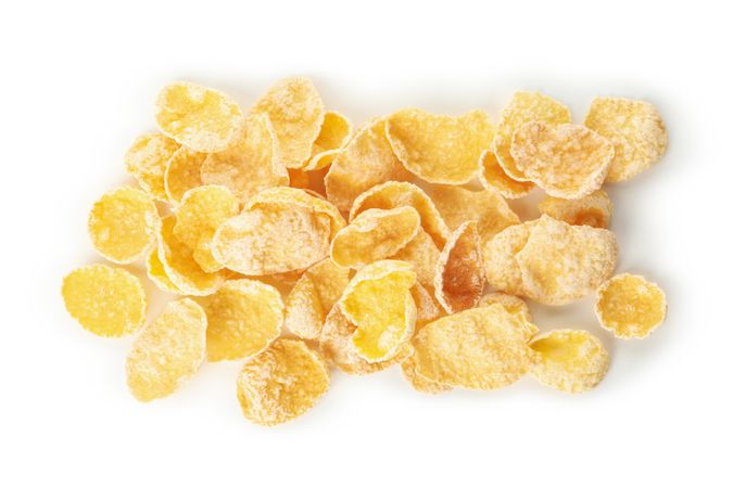 Tasty muesli isolated on plain background, close up