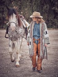 Woman walking with cute horse
