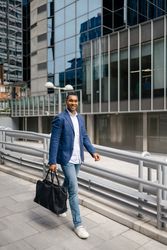Man walking through financial area with briefcase