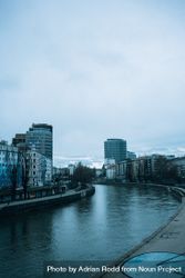 River in Vienna, Austria on overcast day, vertical 5rdEdb