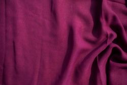 Soft purple fabric wavy crumpled background abstract with copy space