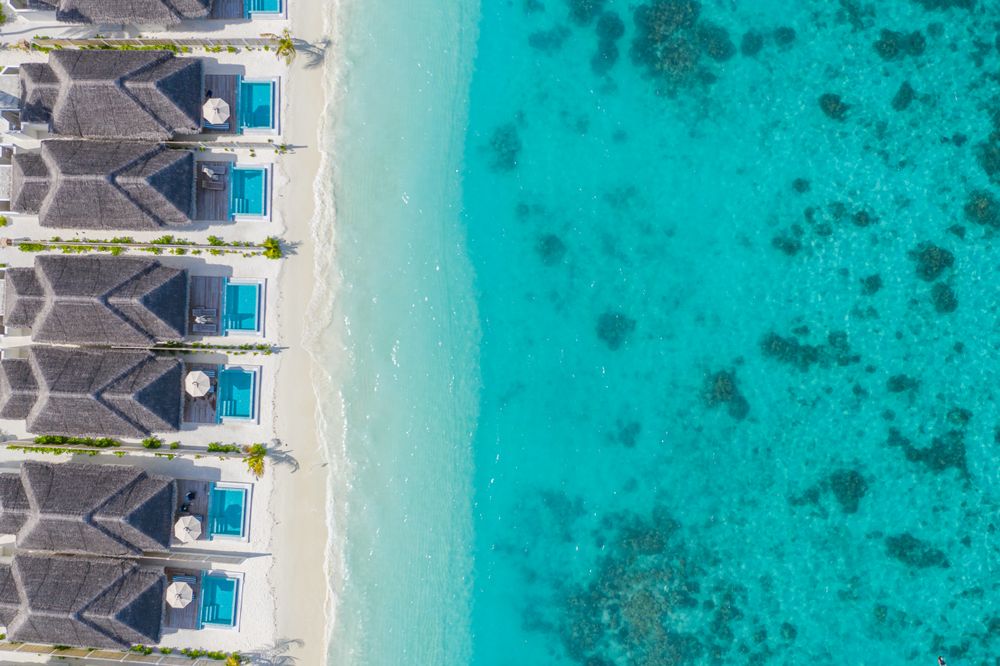 Holiday villas on the beach, aerial shot