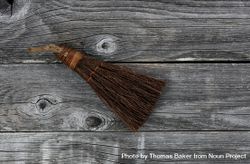 Vintage handbroom on old wooden floor 0v2NR0