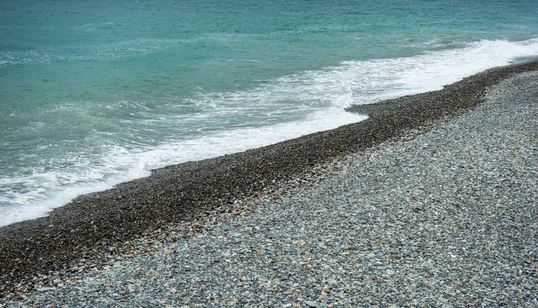 Waves coming onto pebbles on beach in Adjara region of Georgia