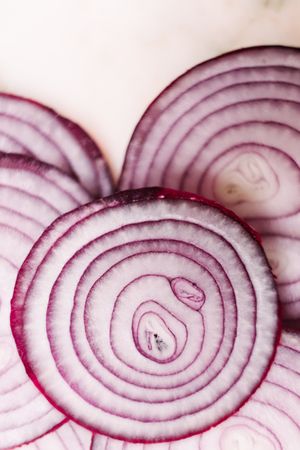Slices of onion on tabletop