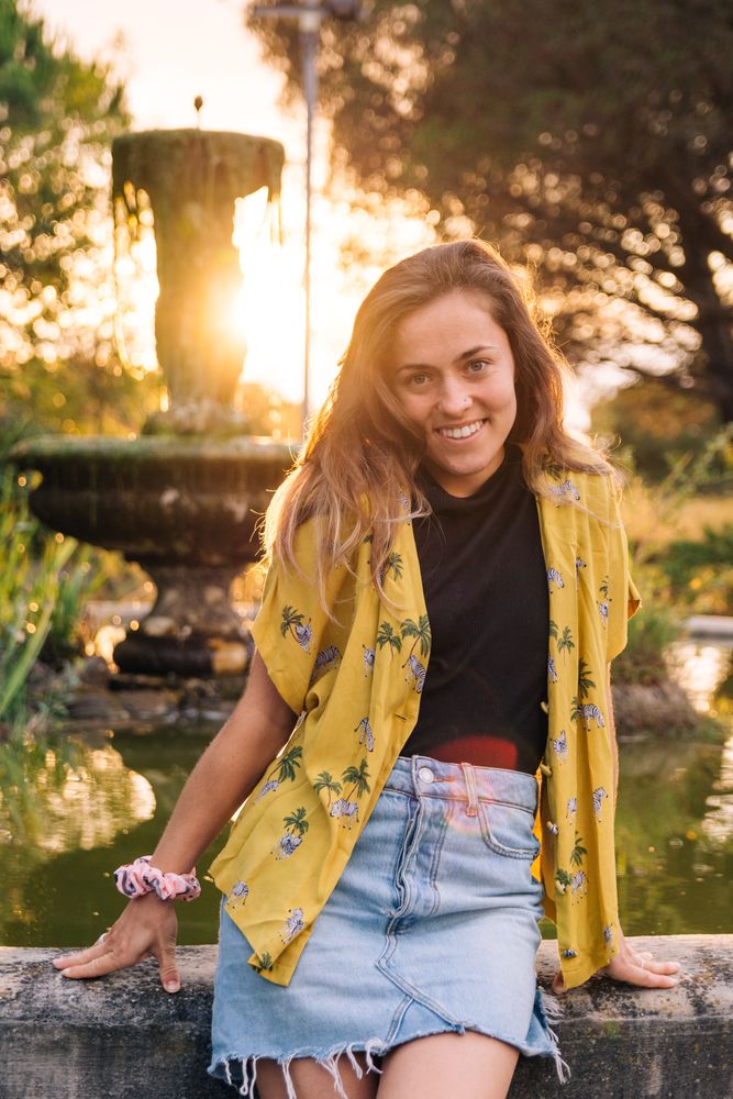 Woman posing at dusk