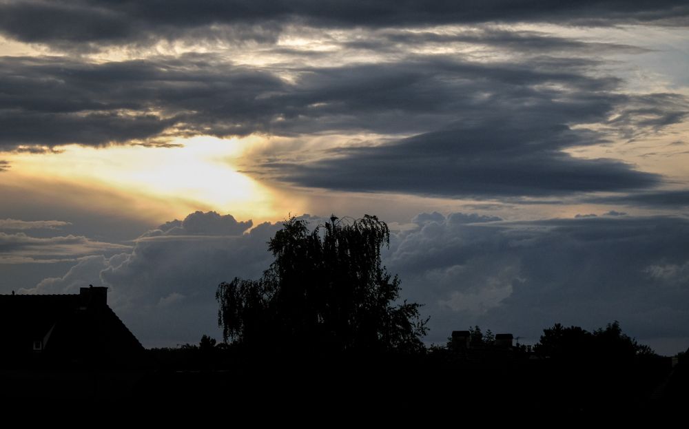 Sunset on cloudy gloomy day