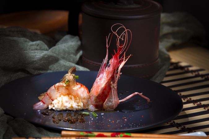 Tasty shrimps decorated on plate in restaurant