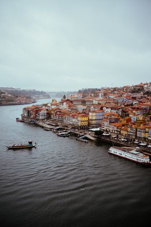PORTO, PORTUGAL - February, 11, 2019 : Vessels floating near old city