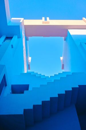Blue building with straight interesting stairs