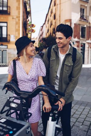 Happy couple having fun while walking in town