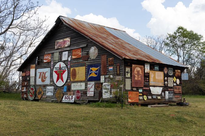 Rustic barn covered in vintage metal signs