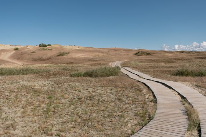 Deserted field with wooden overpass