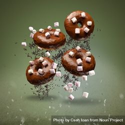 Flying chocolate glazed doughnuts 5Q221d