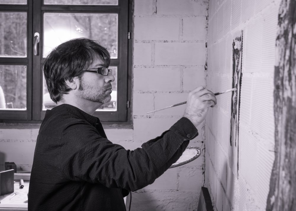 Painter artist working on a oil canvas