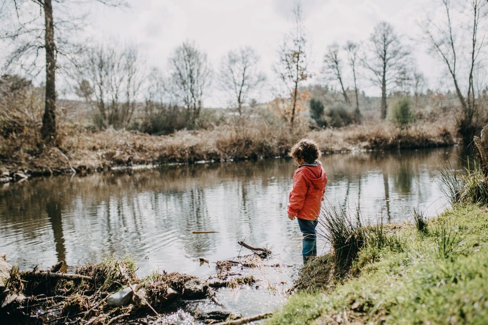 Young girl overlooking a marsh