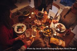 Top view of dining table during Christmas dinner at scandinavian home 0KLAY5
