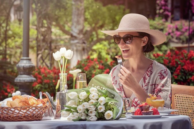 Woman Enjoying Breakfast in the Garden