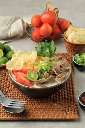 Soto betawi, bowl of Indonesian beef stew