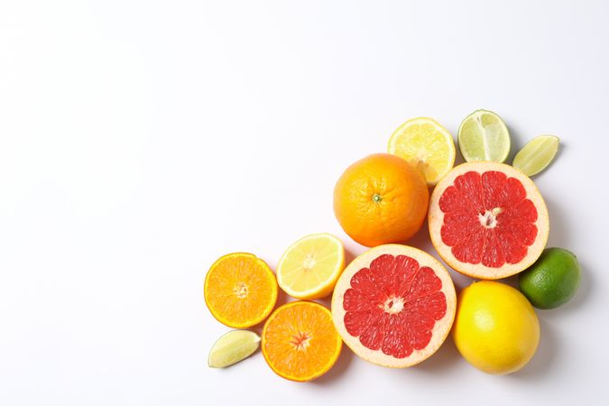 Composition with vegetables and fruits on blank background, space for text