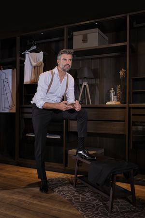 Stylish man in white shirt looking away