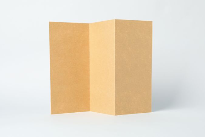 Empty craft cardboard on light background, space for text