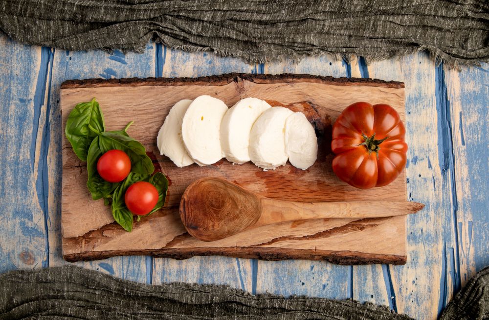Salad ingredients on board and napkin