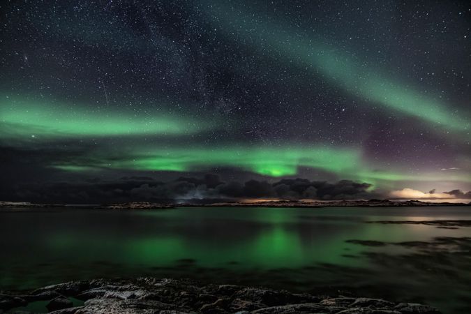 Aurora in starry night sky