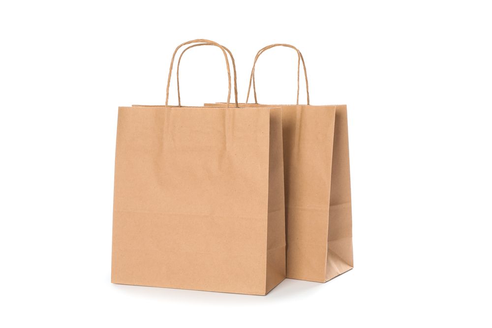 Empty paper bags isolated on blank background