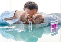 Assistant making test with samples in laboratory