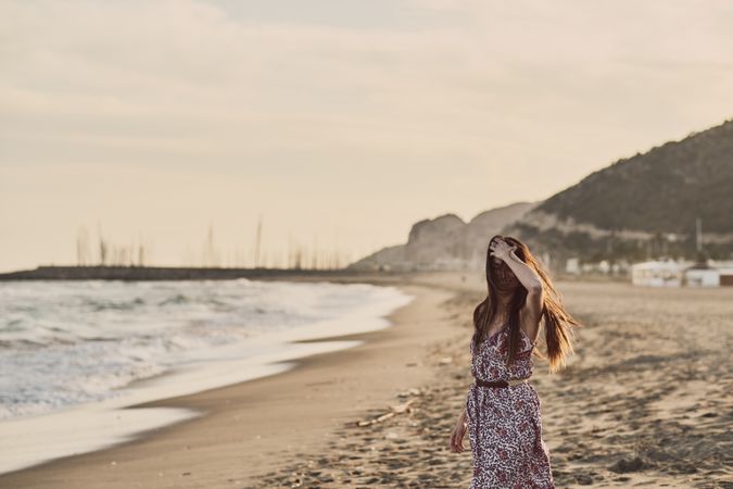 Woman with dress at the beach
