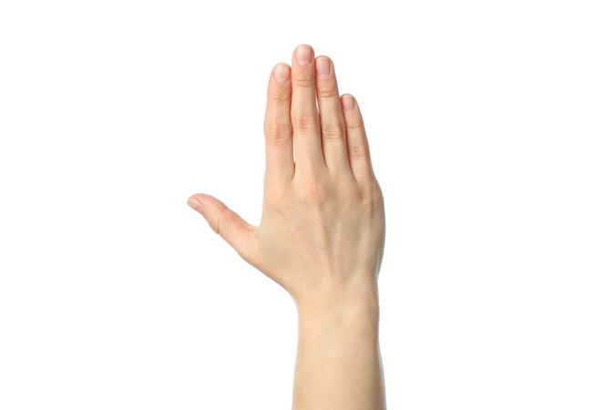 Woman hand isolated on plain background. Gestures