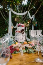 Wedding table decoration in rustic style placed outdoors