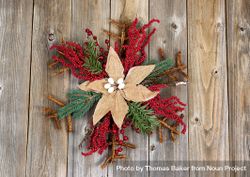 Christmas wreath with cloth flower on rustic wood 4O9eJ0