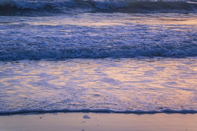 Waves coming into the beach, close up