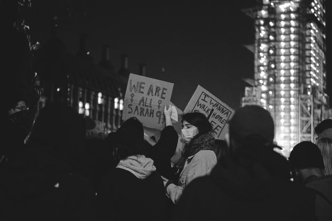London, England, United Kingdom - March 16, 2021: Group of protestors with signs in London