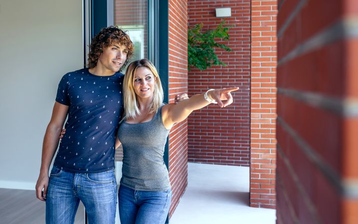 Couple watching new house to buy it
