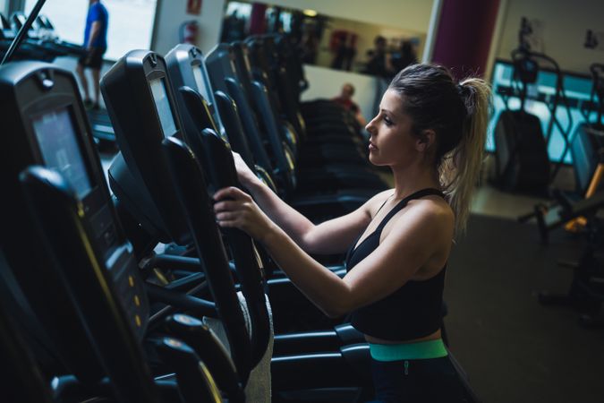 woman on exercise machine