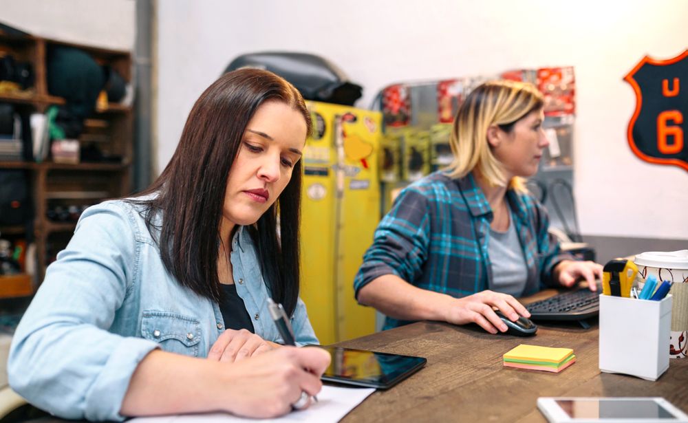 Concentrated females entrepreneur working in a small business to sell through online ecommerce