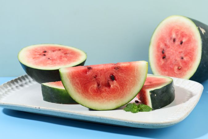 Sliced Red Watermelon on Ceramic Plate