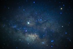 Close-up of Milky way galaxy with stars and space dust in the universe, Long exposure photograph, with grain.