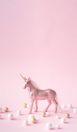 Pink glitter unicorn with gold and shiny decorations