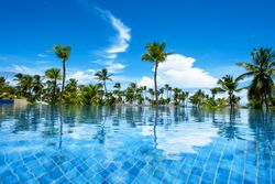Swimming pool with clean water in tropical resort