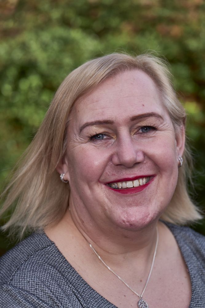 Close up portrait of woman in garden