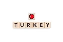 Wooden blocks bearing the name and flag of Turkey.