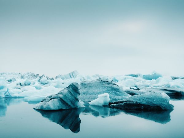 Ice on water between snow