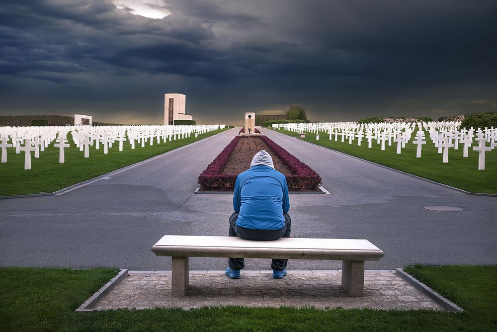Man contemplating in a cemetery