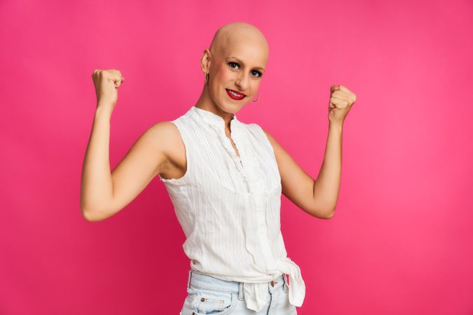 portrait of a woman with cancer with hairless head gesticulating forcefully