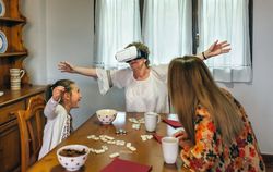 Mature woman using virtual reality glasses